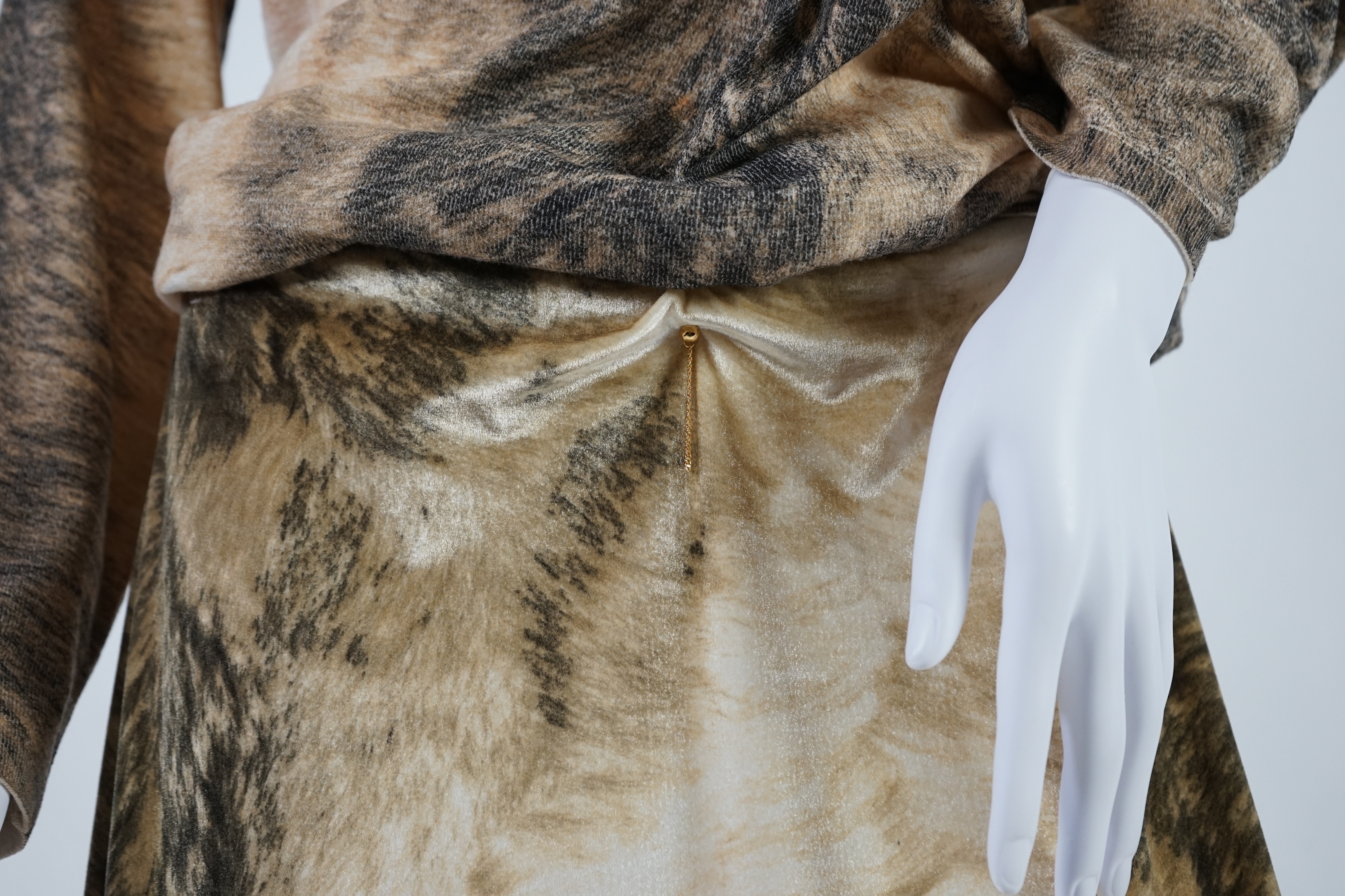 A Roberto Cavalli skirt with matching v neck sweater. Size 14-16 Proceeds to Happy Paws Puppy Rescue